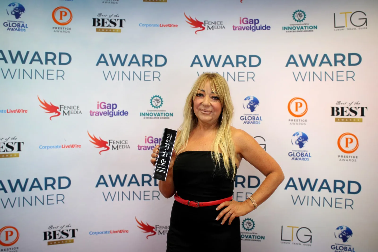 Corrie-Dee Whaite with the 2025/26 Scotland Prestige Awards Platinum Hall of Fame multi-award winner trophy