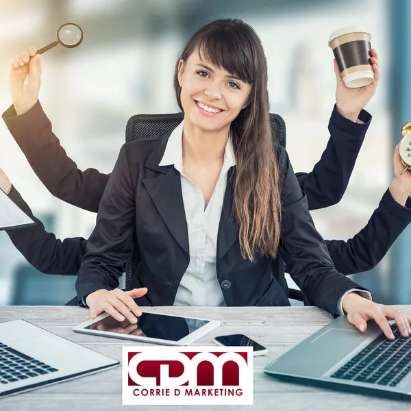 Corrie-Dee Whaite multitasking — Corrie D Marketing founder