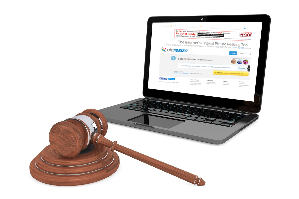 Wooden gavel beside a laptop displaying a GDPR readiness banner, representing data protection law